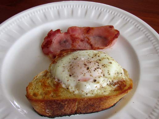 egg on toast with fresh egg and sourdough bread