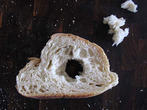 preparing sourdough bread for egg on toast