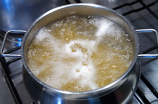 cooking pasta in rapidly boiling water