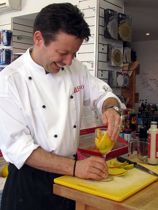 David Bitton peeling a mango