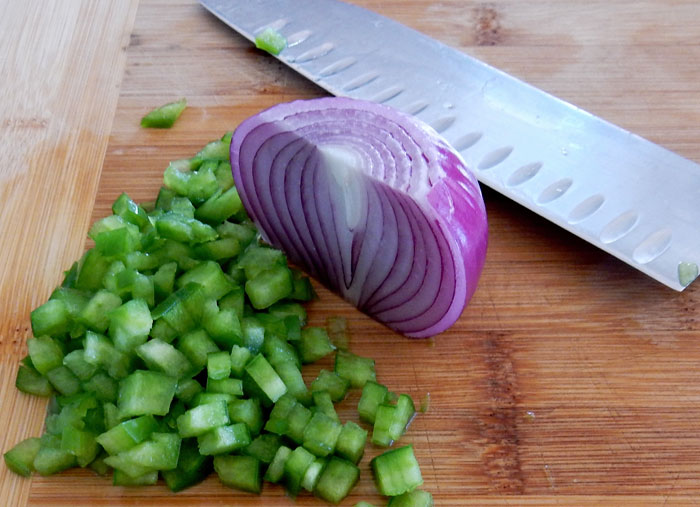 Diced green capsicum and red onion